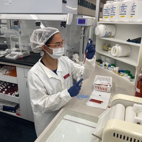 image of woman making a compounded medication